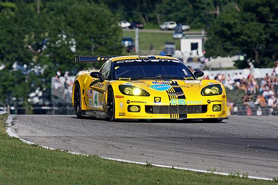 Close up front view of a ALMS/IMSA Yellow Compuware Chevrolet Corvette C6.R